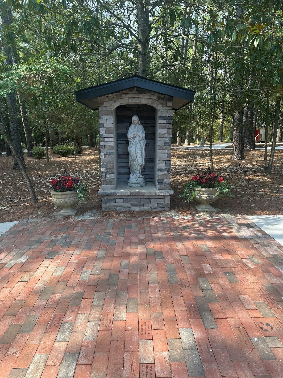 The shrine at the head of the Walk to Remember, with engraved bricks leading up to it