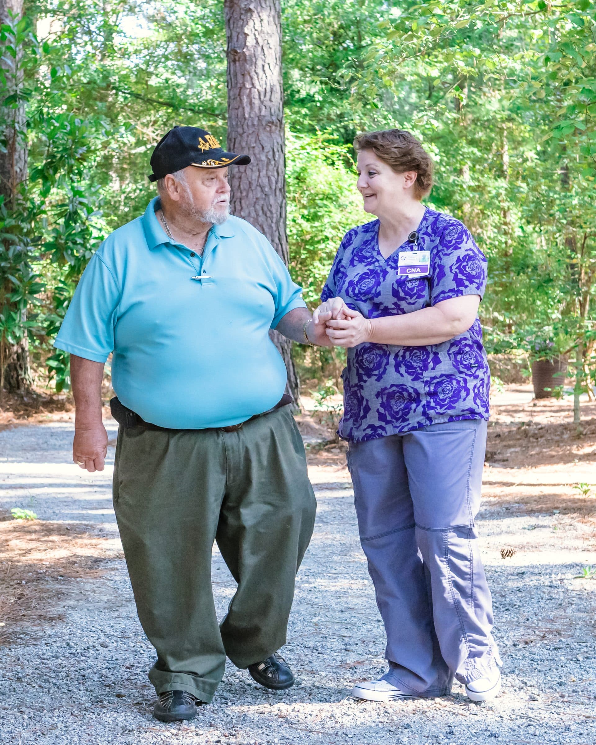 A Richmond County Hospice caregiver comforting a patient